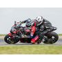 Voir la diapositive 2 : Smartbox Baptême passager en moto : 3 tours à l'arrière d'un pilote professionnel sur le circuit de Pau-Arnos - Coffret Cadeau Sport & Aventure
