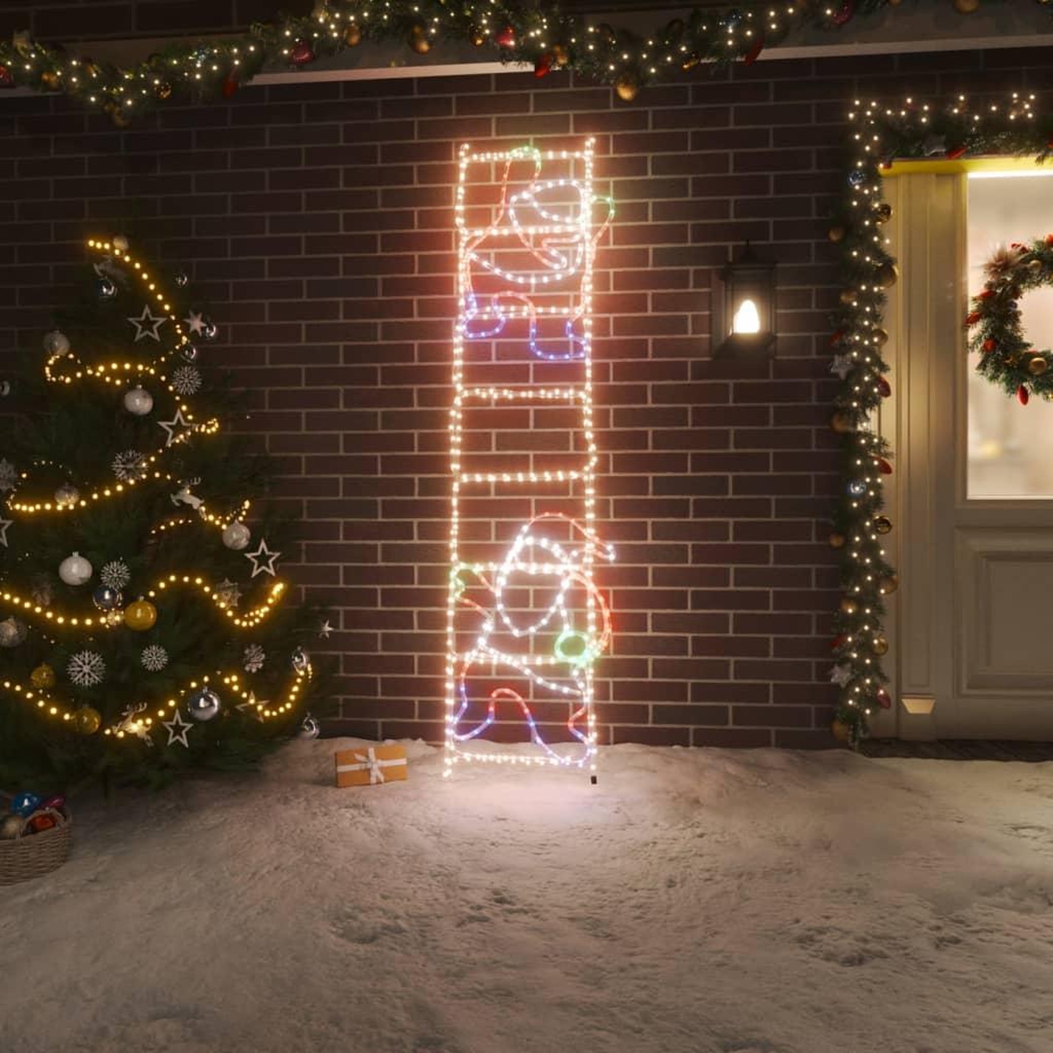 VIDAXL Figurine Pere Noël sur echelle pliable avec 552 LED 50x200 cm