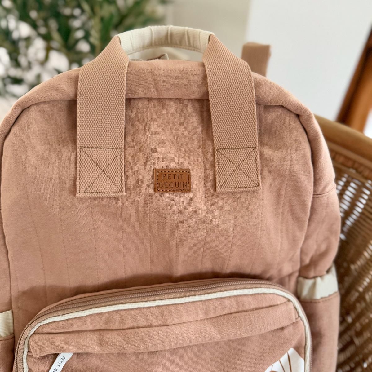 Petit Béguin Sac à dos à langer Mini Loutre