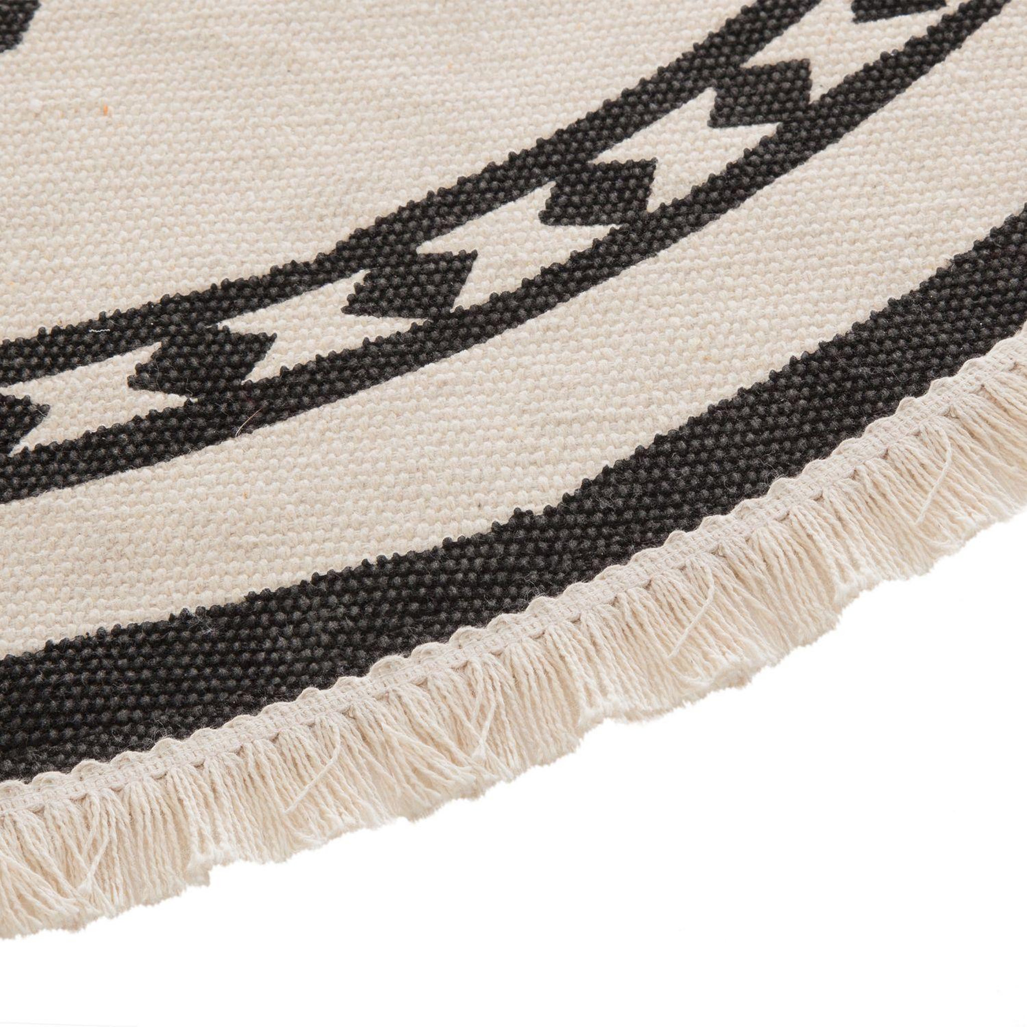 Voir la diapositive 3 : ATMOSPHERA Tapis ethnique Nomade - Diam. 90 cm - Beige