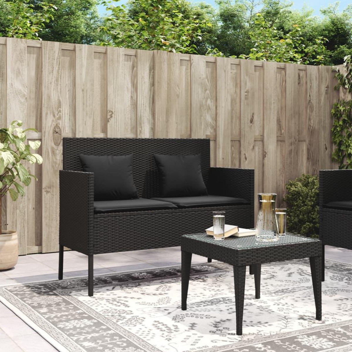 VIDAXL Banc de jardin avec coussins noir resine tressee