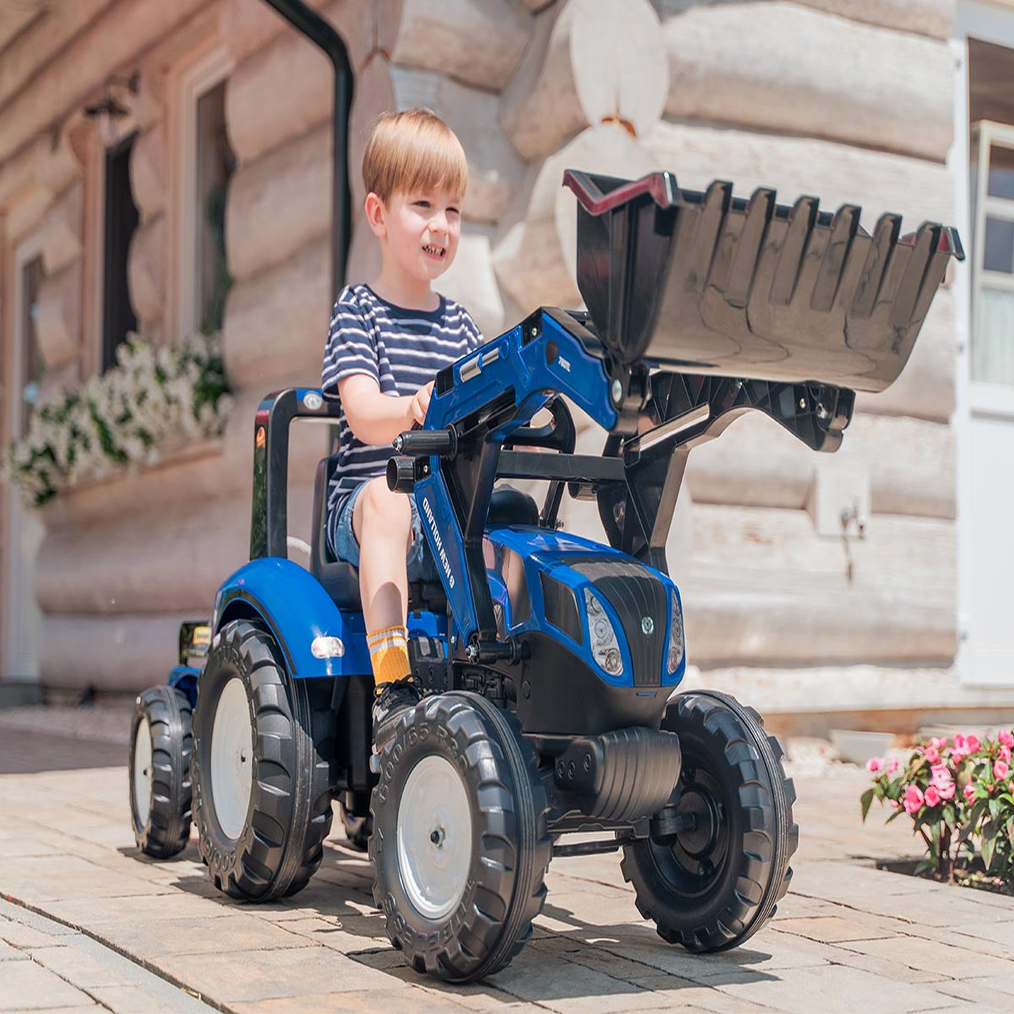 Voir la diapositive 2 : FALK Tractopelle enfant New Holland avec remorque 3 à 7 ans - Falk