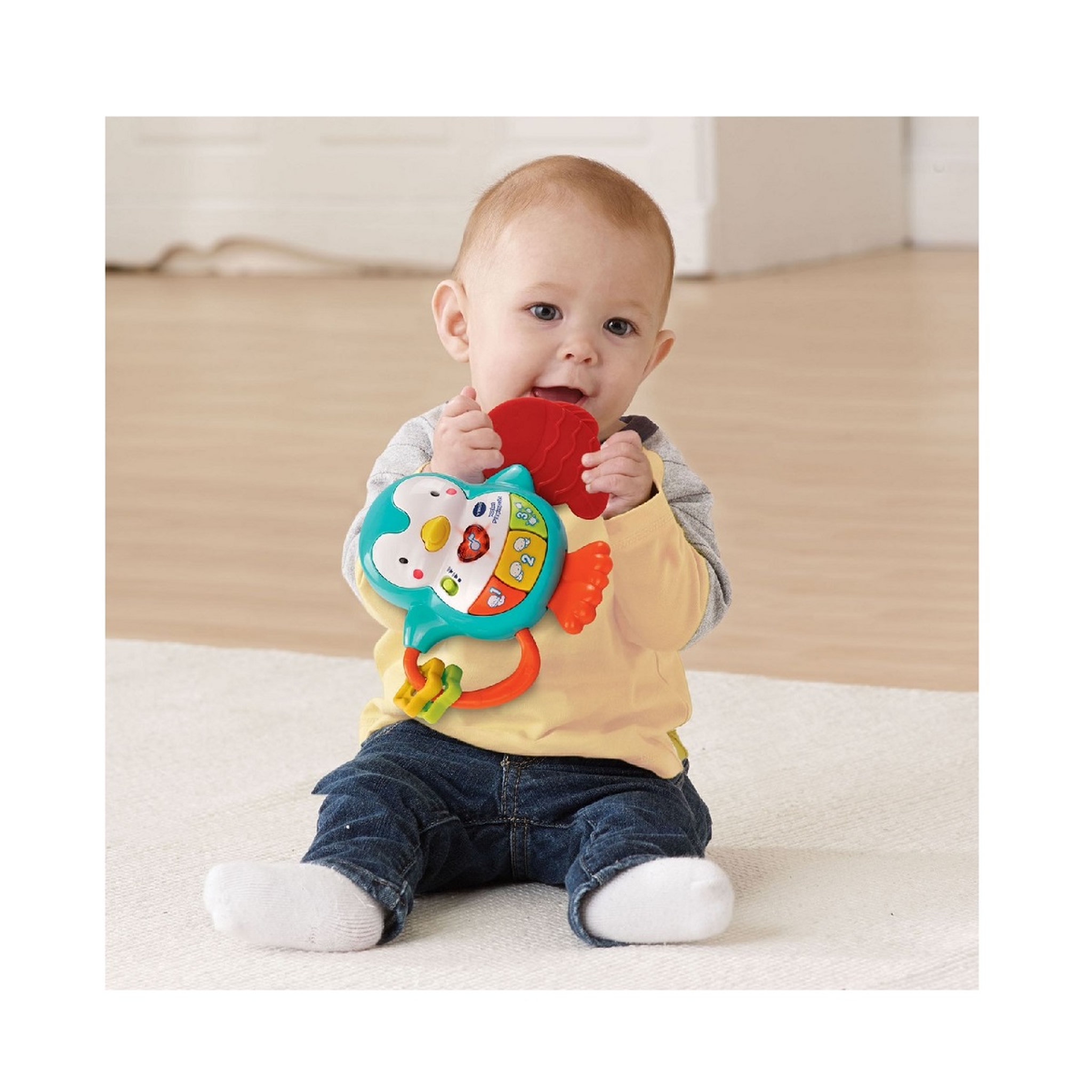 Voir la diapositive 2 : VTECH Hochet P'tit Pingouin interactif 